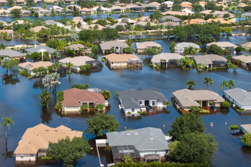 Flooded houses from hurricane Debby rainfall water in Laurel Meadows community in Sarasota, Florida. Aftermath of natural disaster in USA south